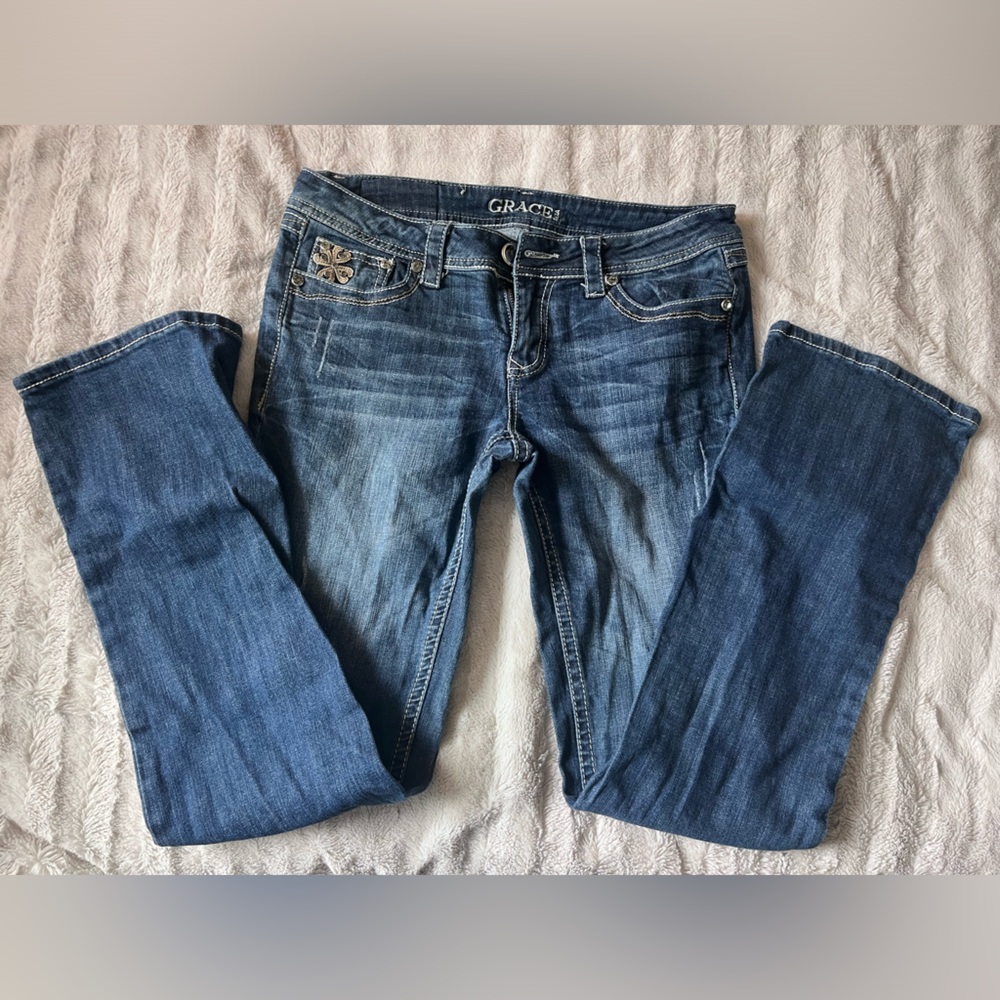 Grace in L.A. woman’s jeans size 29 with Cross detail on back pockets